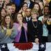 University of Michigan President Mary Sue Coleman smiles as President Obama acknowledges her during a speech at the Al Glick Fieldhouse on Friday morning.  Melanie Maxwell I AnnArbor.com